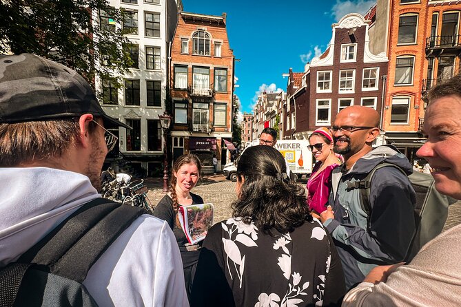 Small Group Walking Tour - Hello Amsterdam - Damrak and the dancing houses