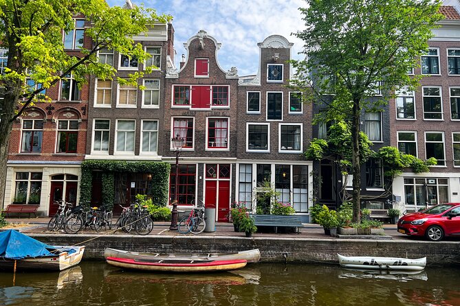 Small Group Walking Tour in Amsterdam with Friendly and Fun Guide - Jordaan: from canal builders to village-like streets