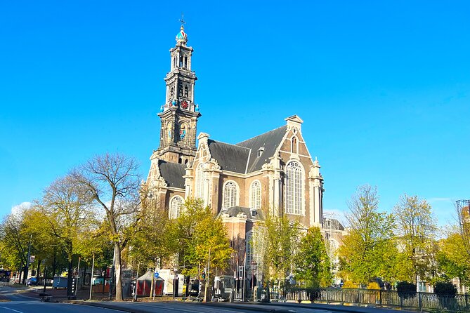 Walking Tour about Golden Age Architecture, private local guide - Prinsengracht warehouses and practical design